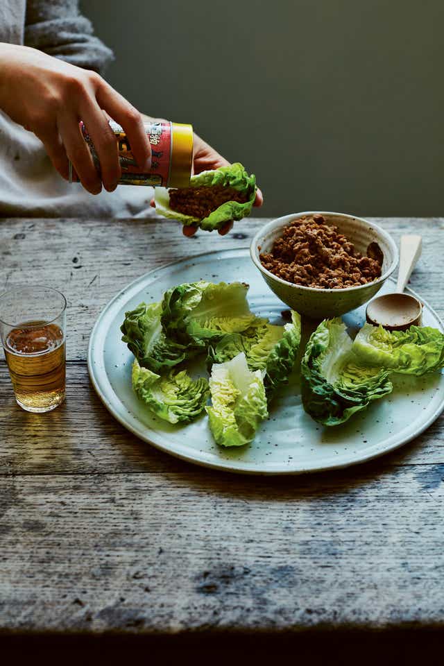 <p>You can serve it with tofu, rice or noodles, but this is the classic way: spooned into lettuce leaves </p>