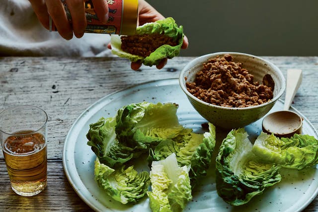 <p>You can serve it with tofu, rice or noodles, but this is the classic way: spooned into lettuce leaves </p>