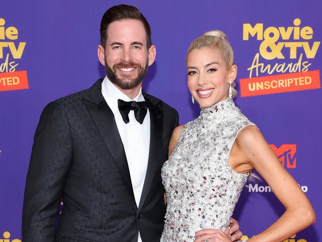 <p>Tarek El Moussa and Heather Rae Young attend the 2021 MTV Movie & TV Awards: UNSCRIPTED in Los Angeles, California</p>