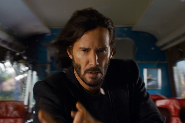 <p>Keanu Reeves in ‘The Matrix Resurrections'</p>