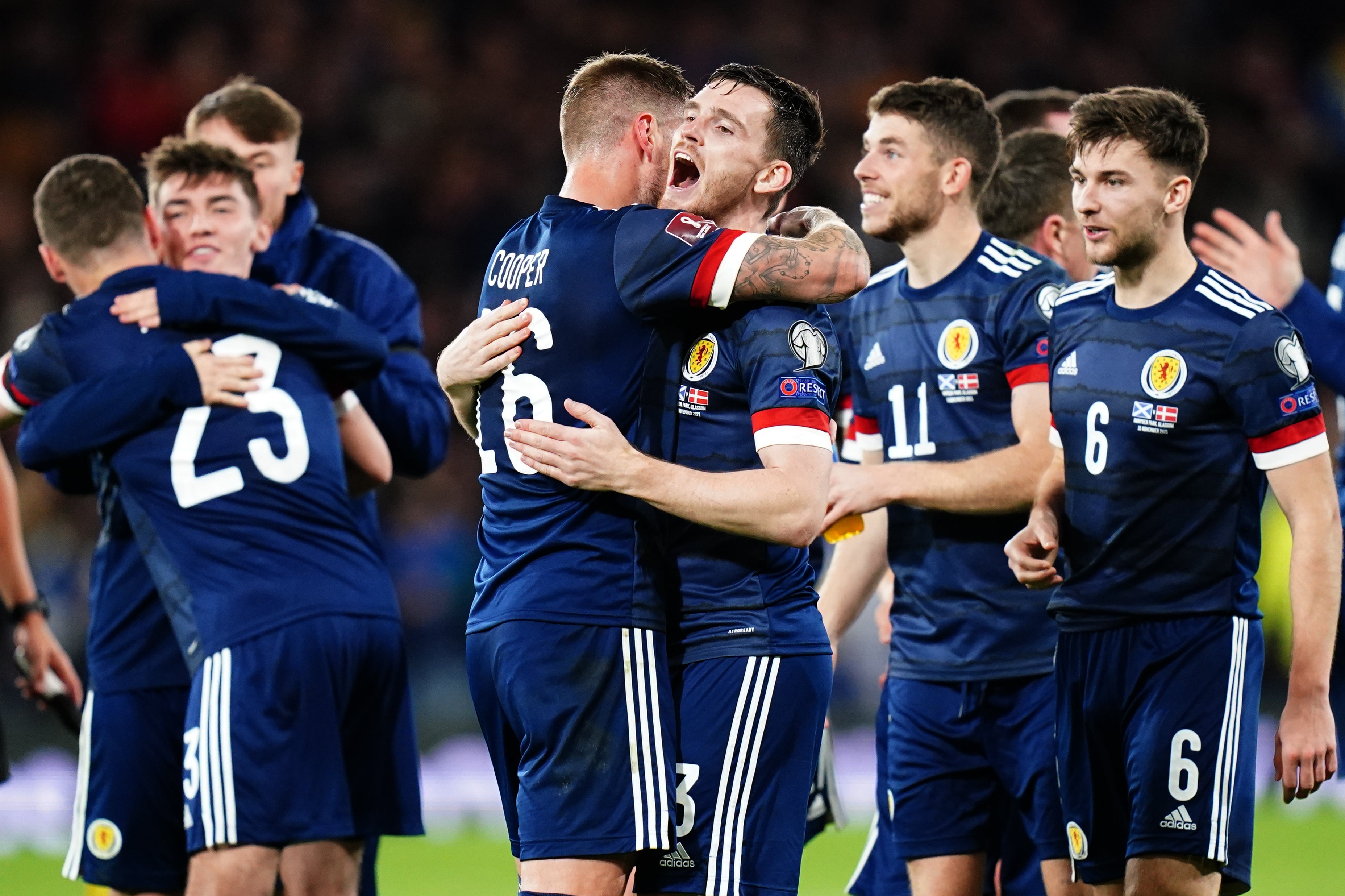 Scotland celebrate booking a home play-off (Jane Barlow/PA)