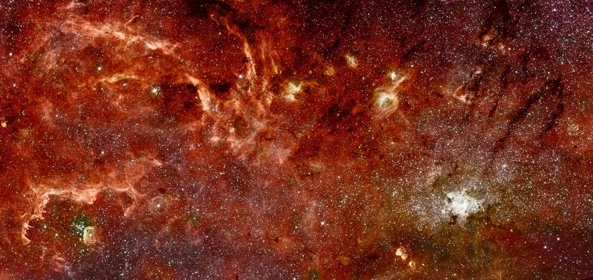 Red alert: the centre of our galaxy can be seen on the lower left