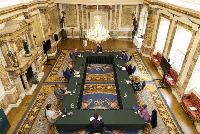 Minister for Foreign Affairs Simon Coveney meeting party leaders at Iveagh House (Tom Honan/PA)