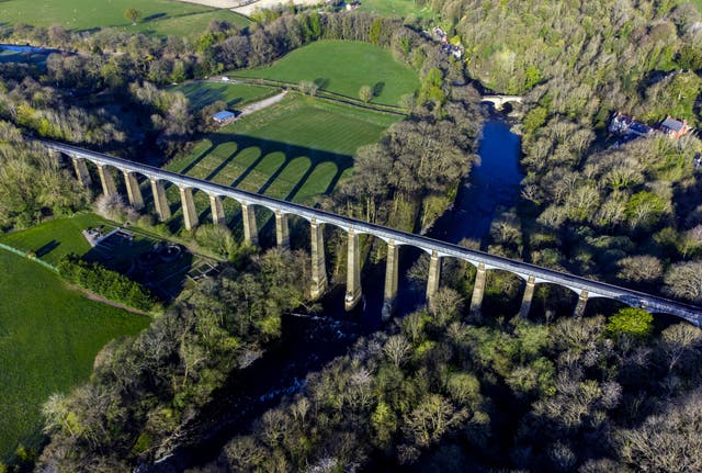 The early morning sun casts shadows at the Pontcysyllte Aqueduct, in Llangollen, North Wales, in April (Peter Byrne/PA)