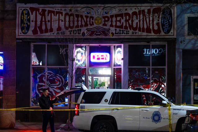 <p>Outside a tattoo parlour involved in the shooting rampage </p>