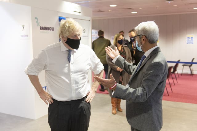 Prime Minister Boris Johnson visited a Covid vaccination centre in Milton Keynes on Wednesday (Geoff Pugh/Daily Telegraph/PA)