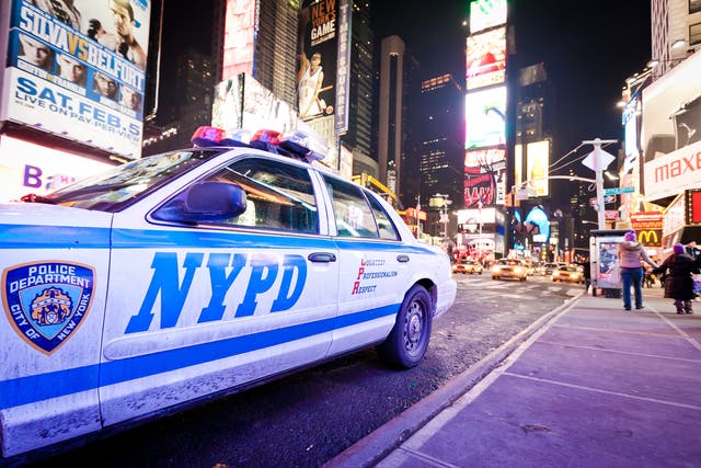 <p>A NYPD patrol car in New York City’s Times Square</p>