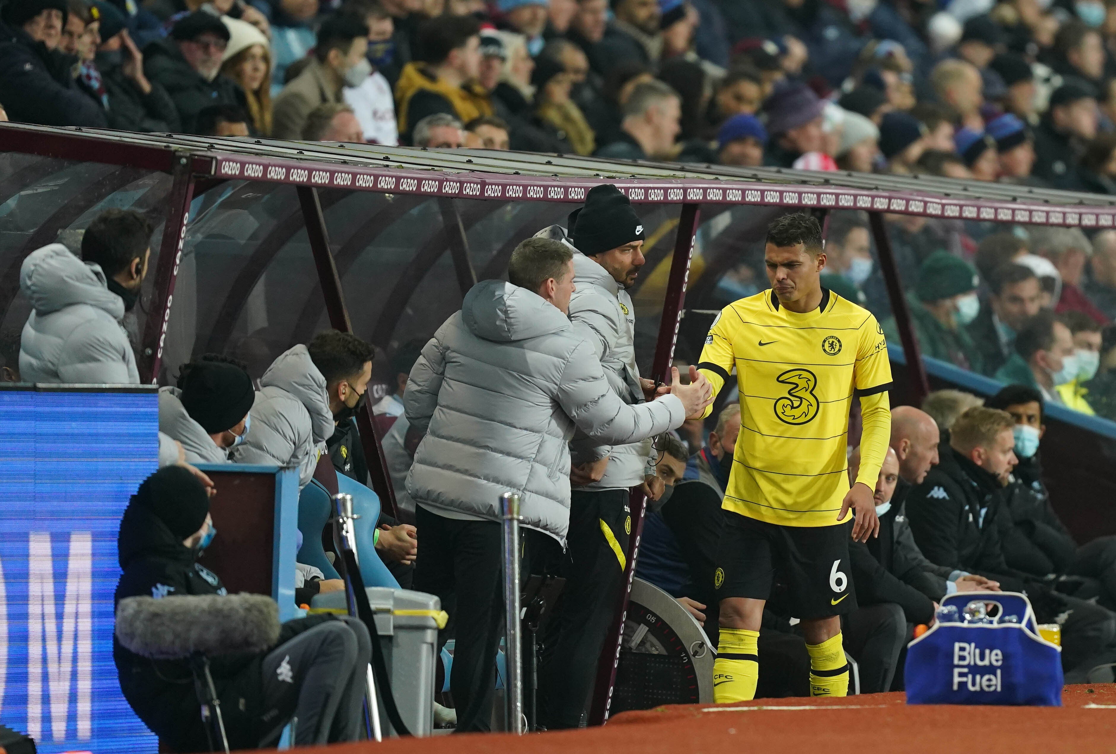 Thiago Silva is consoled by members of the Chelsea backroom staff after being forced to come off with an injury against Aston Villa (Mike Egerton/PA)