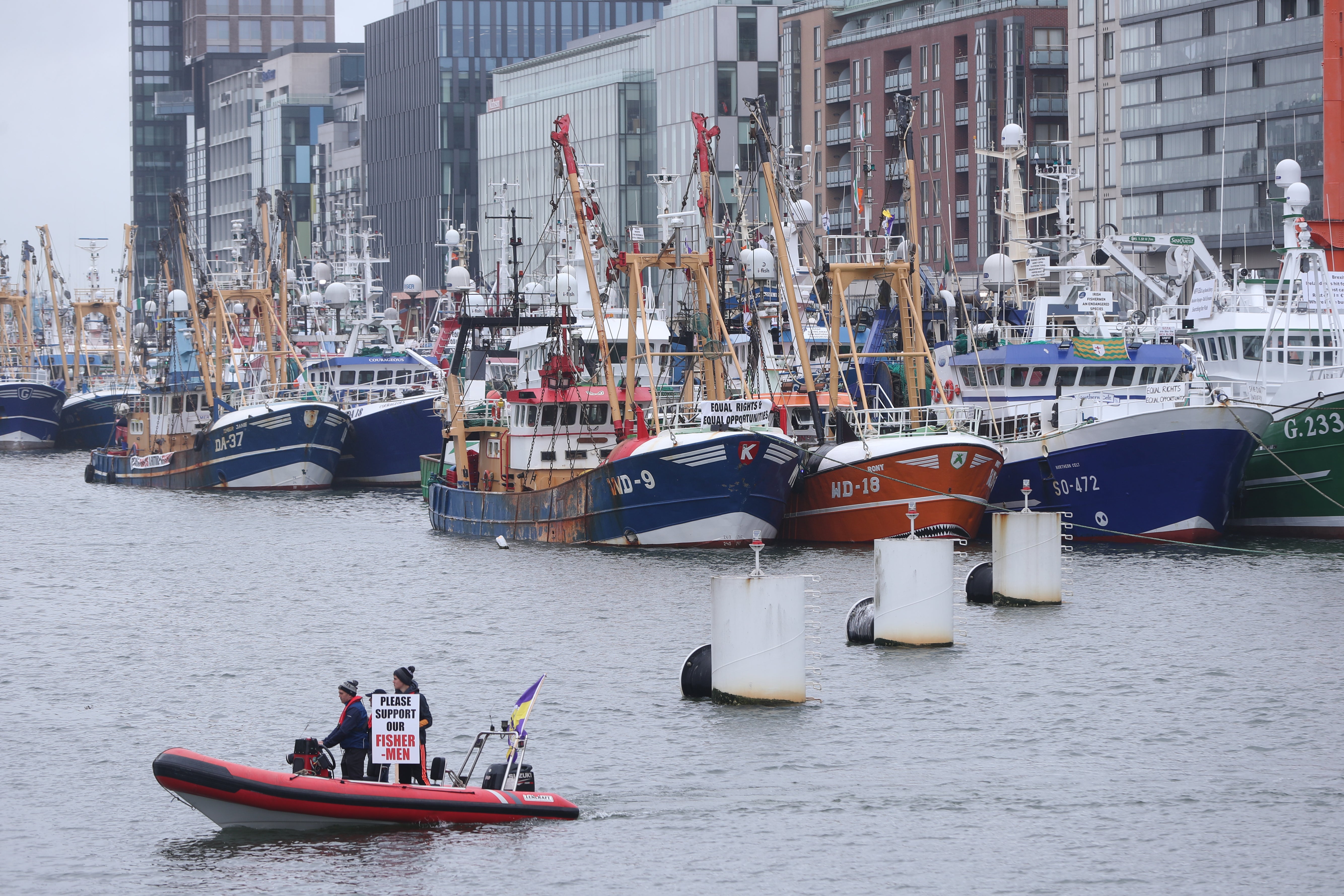 Trawlers gather outside the Convention Centre in Dublin (Niall Carson/PA)