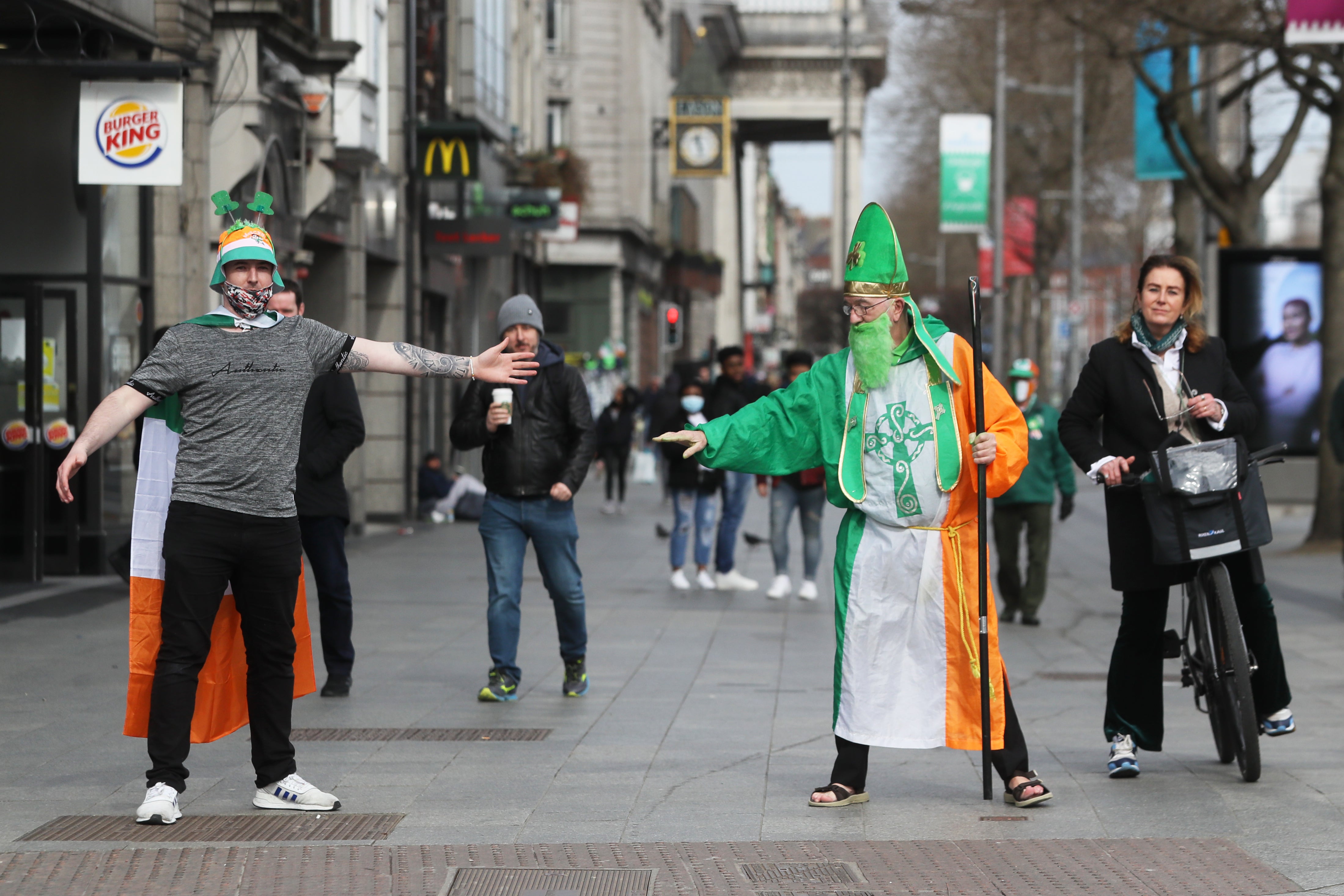 People celebrate St Patrick’s Day on O’Connell Street in Dublin (Brian Lawless/PA)