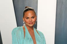 Chrissy Teigen asks fans to stop asking if she is pregnant as she undergoes IVF