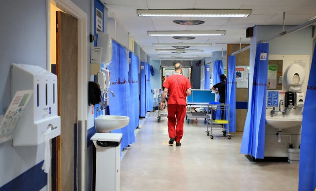 Increased staff absences on wards could lead to pressure to reduce the period of self-isolation (Peter Byrne/PA)
