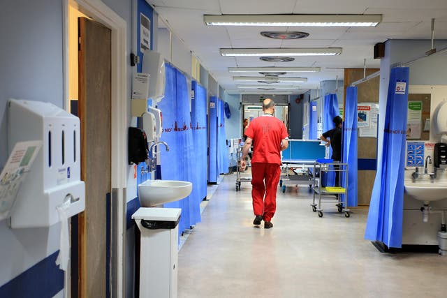 Increased staff absences on wards could lead to pressure to reduce the period of self-isolation (Peter Byrne/PA)