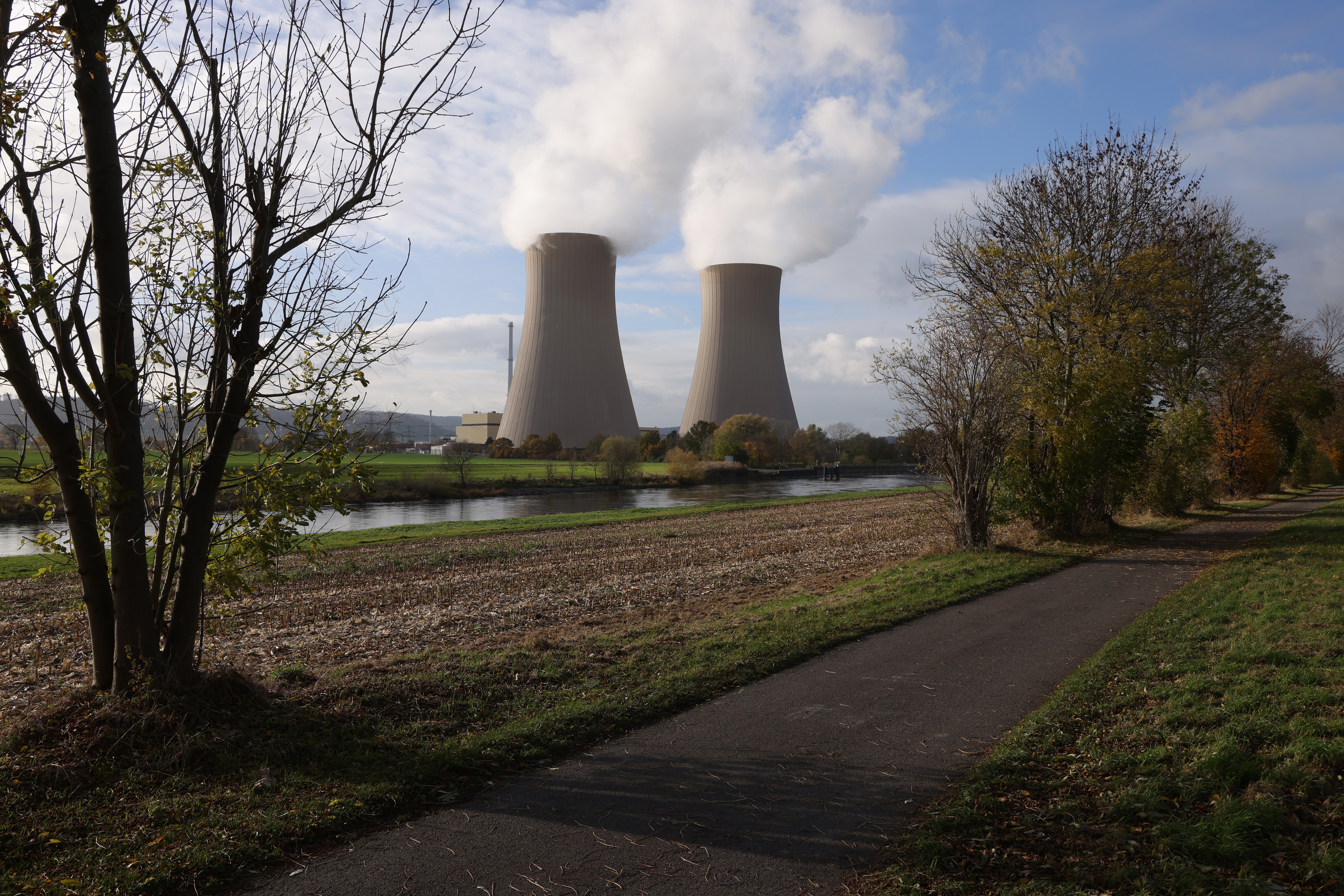 Steam rises from cooling towers of the Grohnde Nuclear Power Plant
