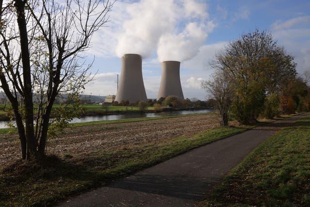 <p>Steam rises from cooling towers of the Grohnde Nuclear Power Plant</p>