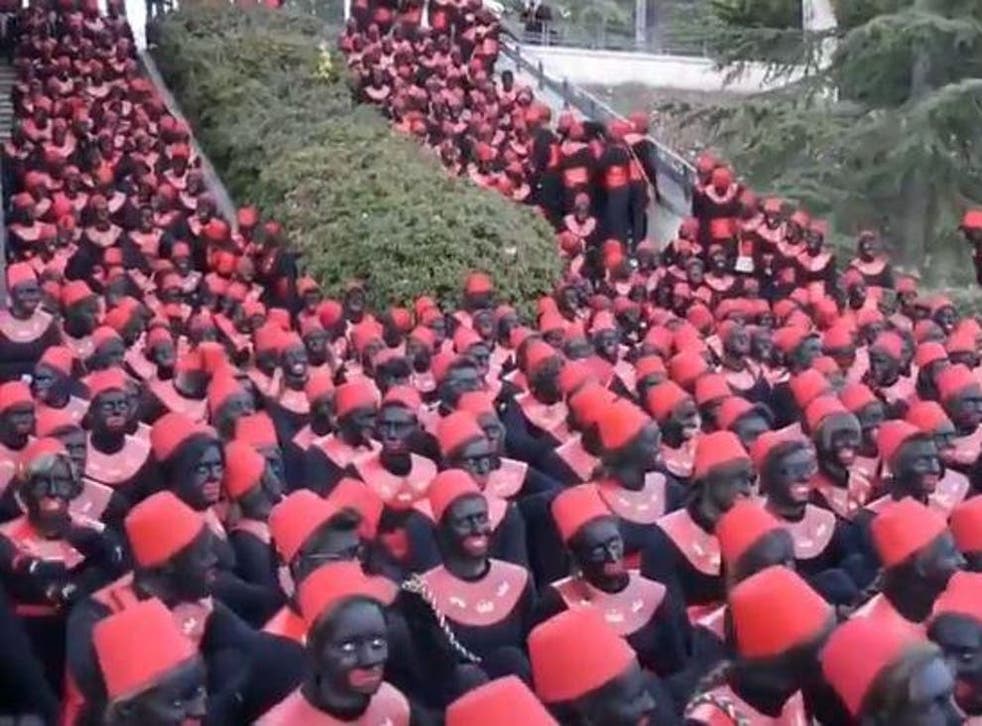 <p>Hundreds of teenagers in Spain wear blackface in Alcoy, Alicante in 2019</p>