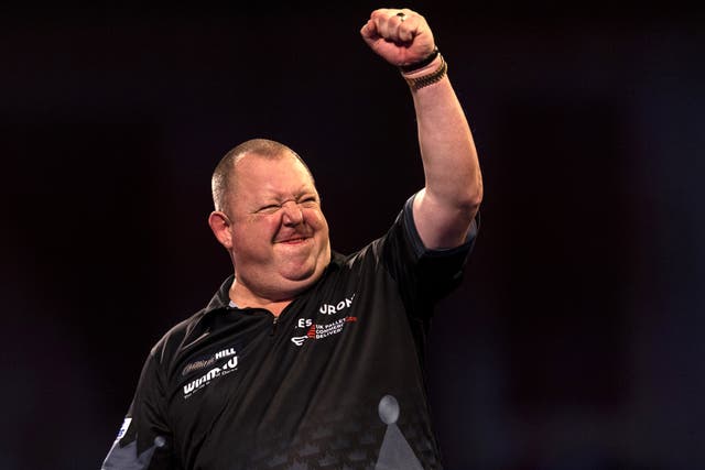 Mervyn King celebrates reaching the quarter-finals of the William Hill World Darts Championship for the first time since 2009 (Steven Paston/PA)