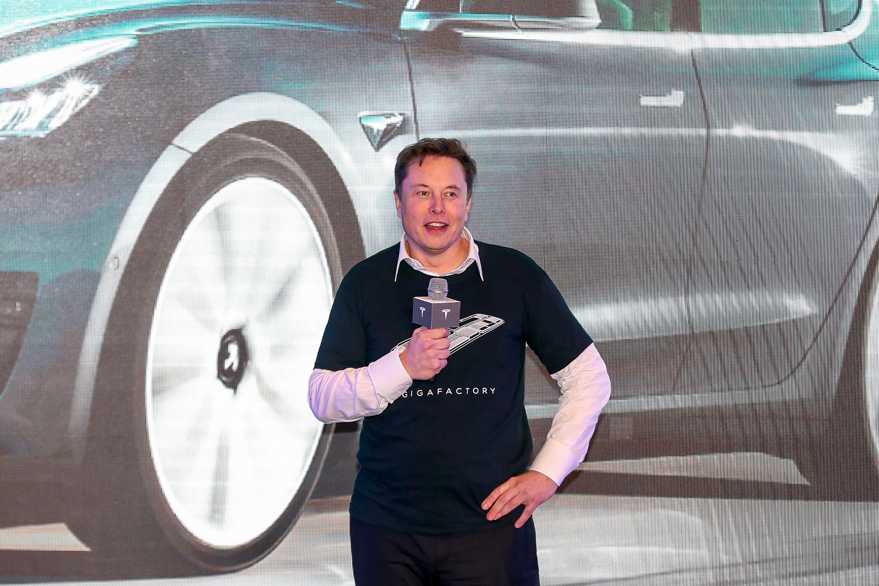 Elon Musk’s Tesla faces backlash for opening showroom in Xinjiang