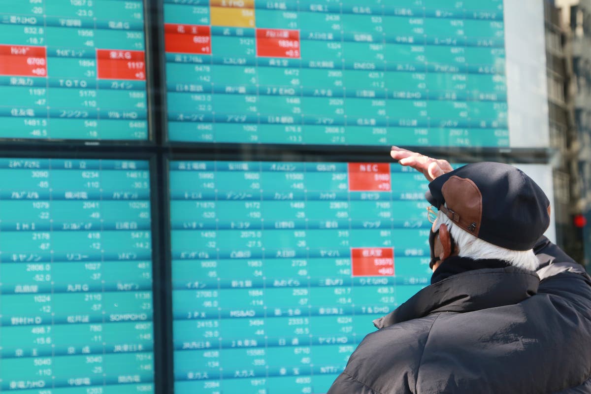 Asian shares mixed in scant New Year Eve trading