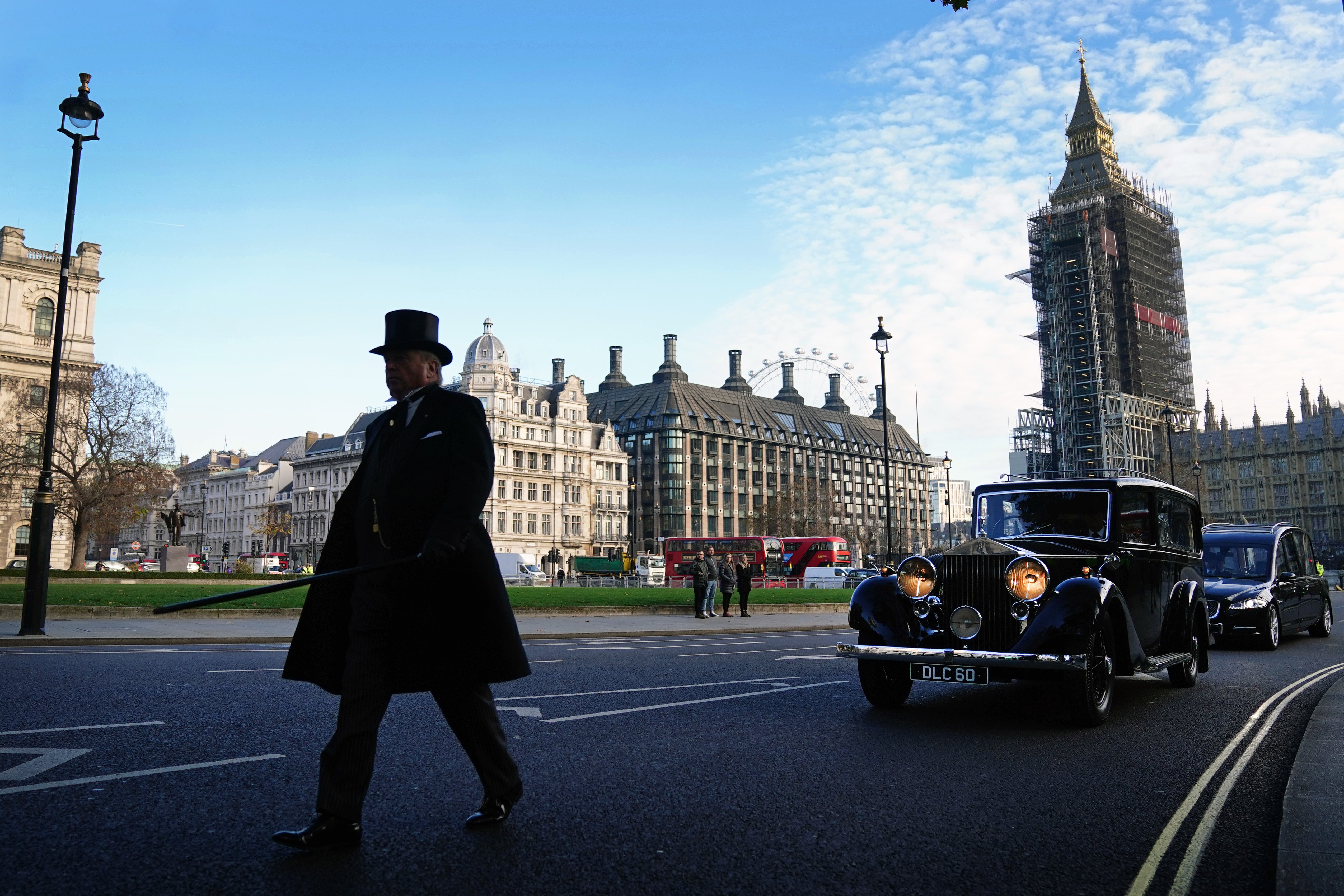 The hearse carrying the coffin of Sir David Amess MP crosses Parliament Square after leaving the Palace of Westminster (Victoria Jones/PA)