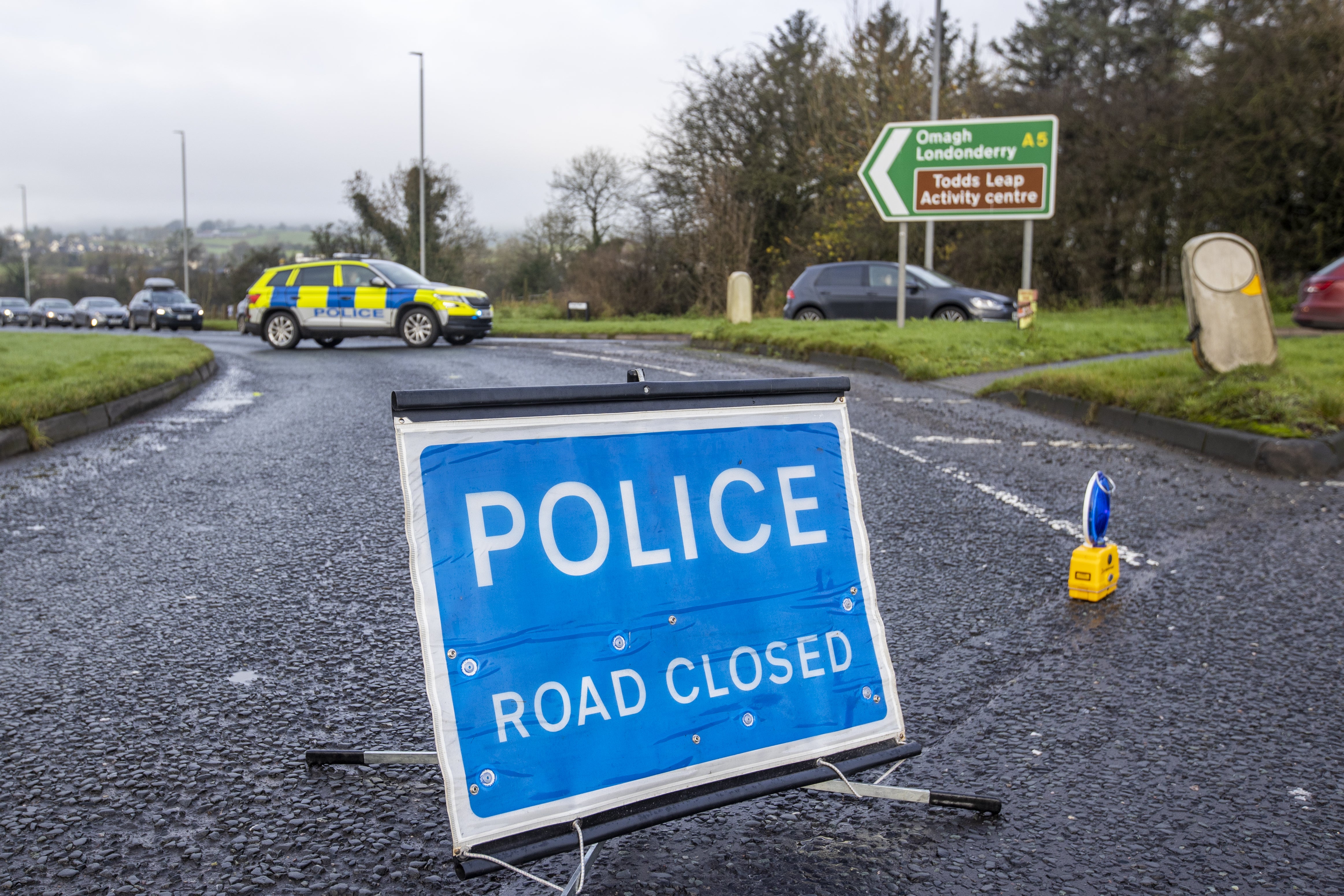 Police at the Ballygawley roundabout, which was closed after three young men were killed in a crash involving a car and a lorry (Liam McBurney/PA)