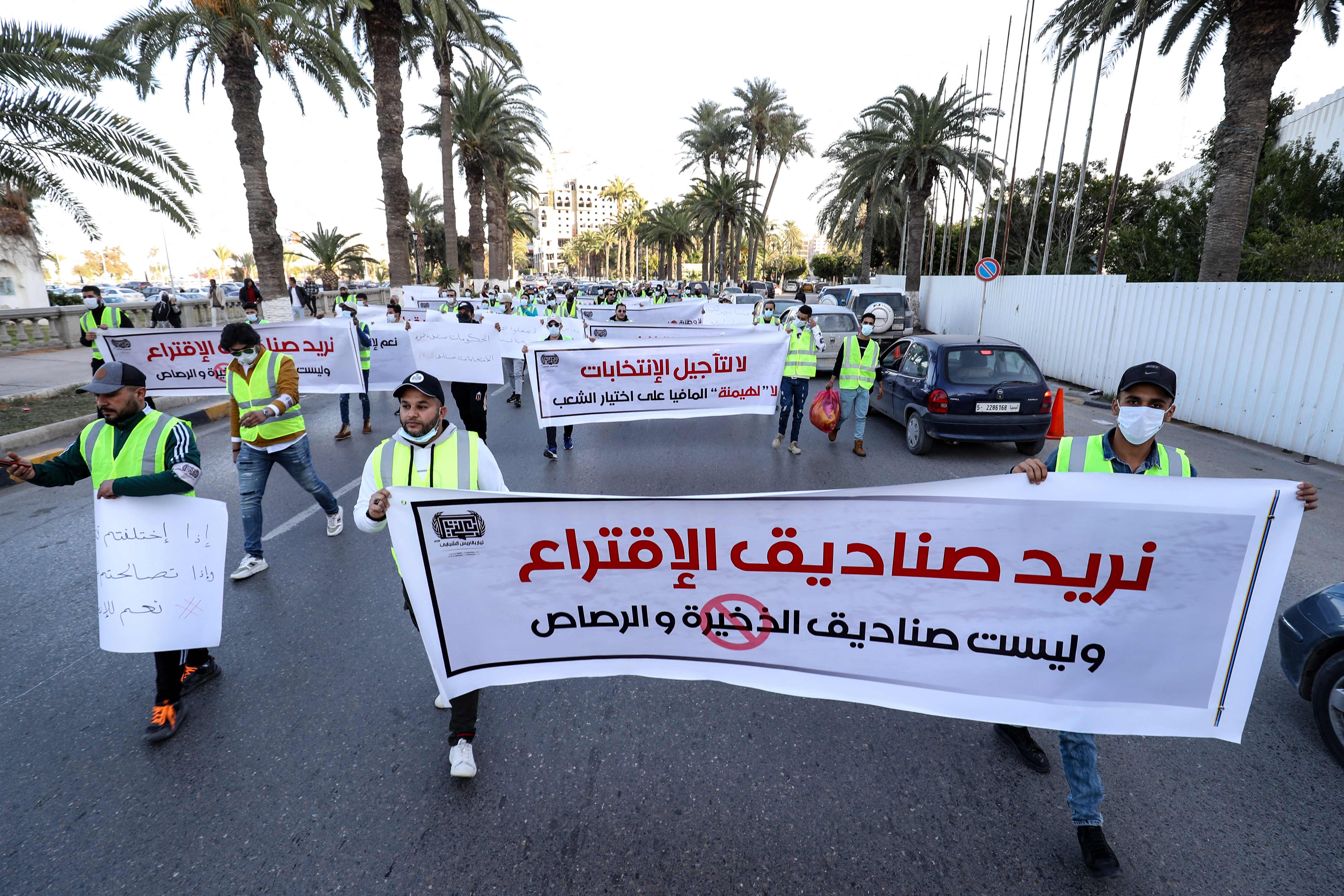 Young Libyan activists in Tripoli’s Martyrs Square, on December 25,2021