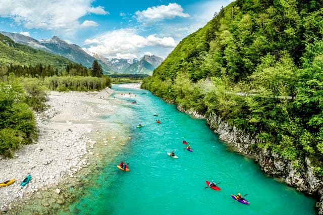 <p>Kayaking on the River Soča in Slovenia</p>