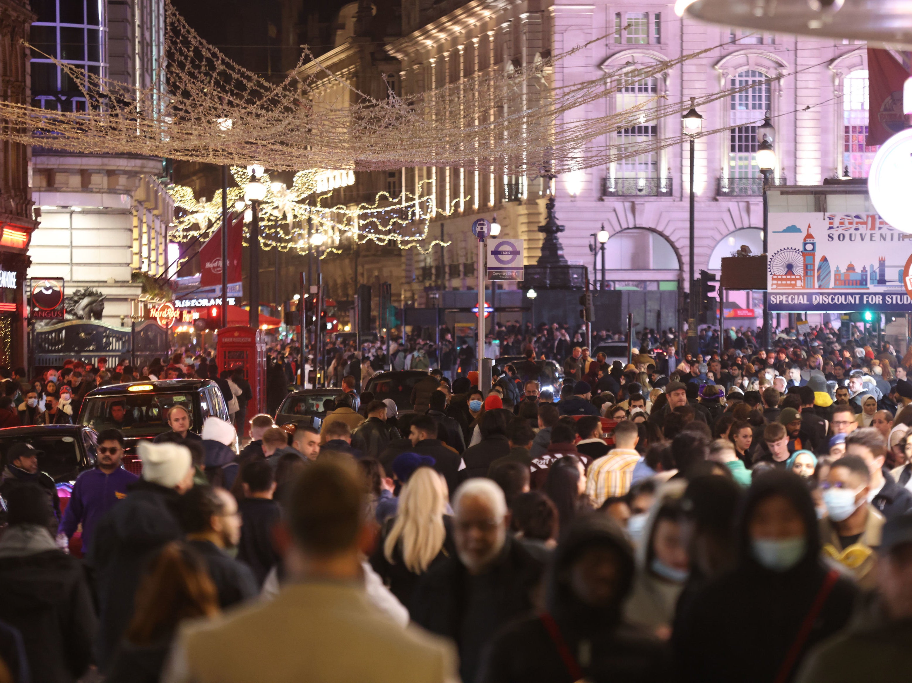 People gather in large numbers in Leicester Square, central London, to celebrate New Year's Eve