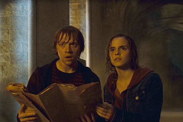 <p>Rupert Grint and Emma Watson in ‘Harry Potter and the Deathly Hallows Part 2'</p>