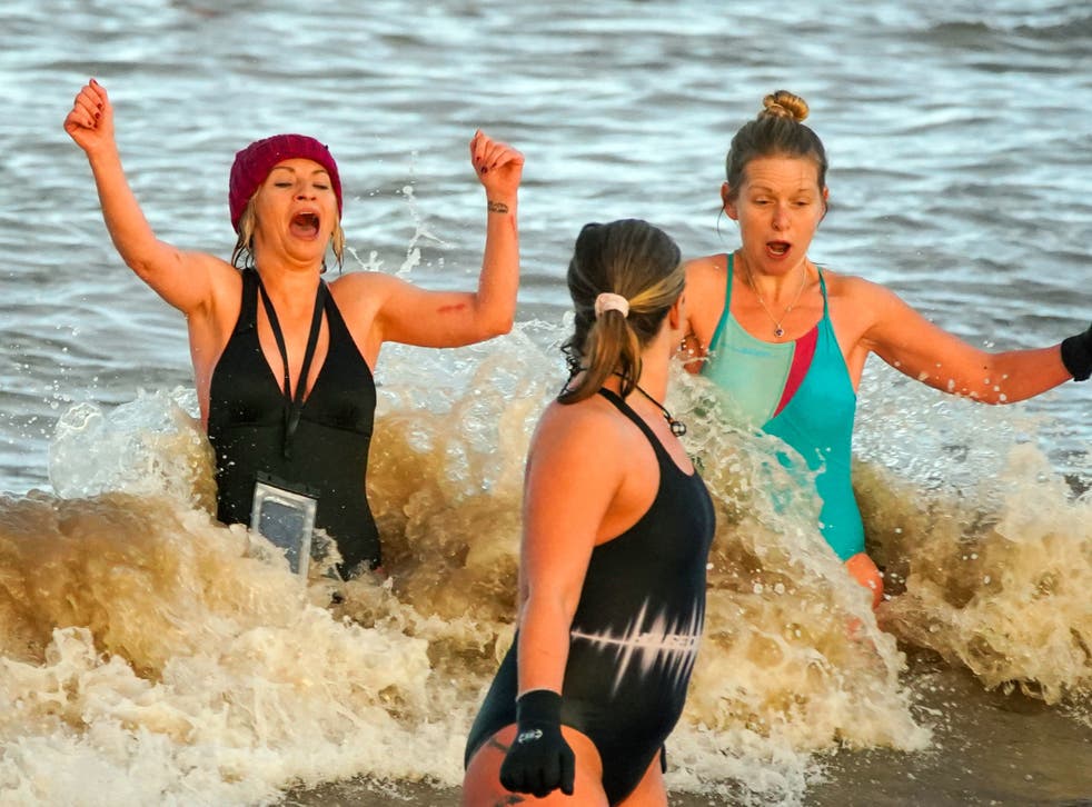<p>People took part in traditional New Year’s Day swims </p>
