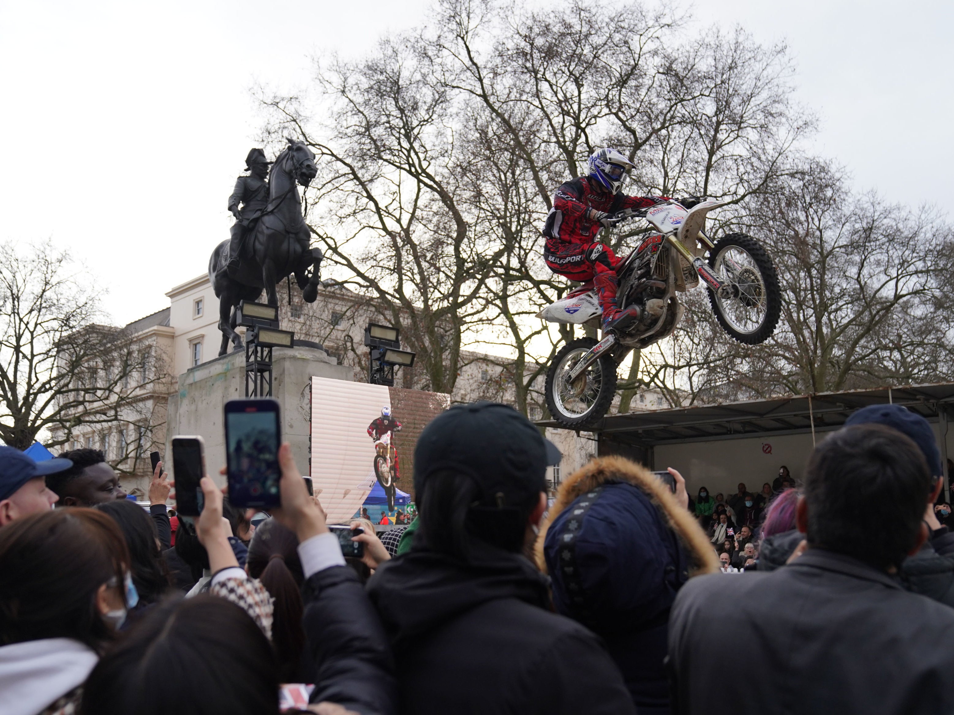 A motorcycle stunt team performs at London’s New Year’s Day parade in Waterloo Place, London
