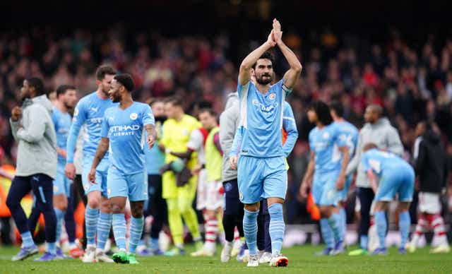 Manchester City’s Ilkay Gundogan applauds the fans after his side’s late win at Arsenal (John Walton/PA)