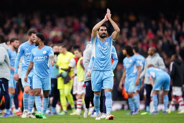 Manchester City’s Ilkay Gundogan applauds the fans after his side’s late win at Arsenal (John Walton/PA)