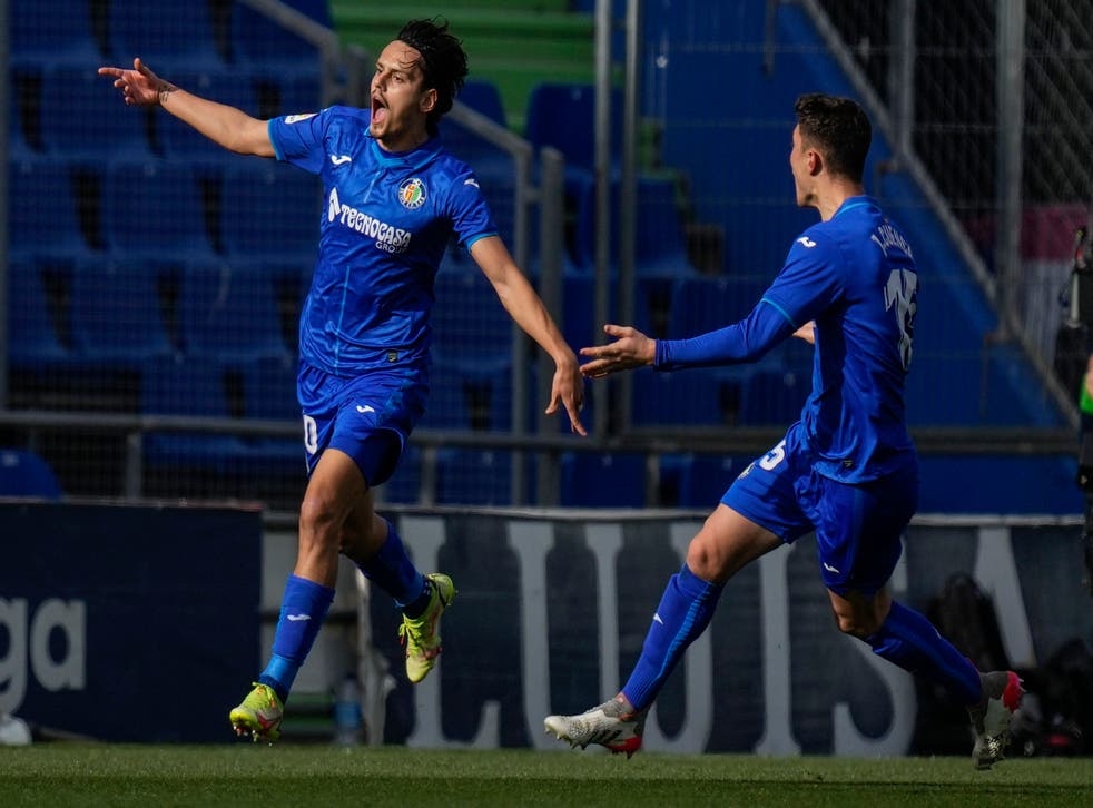 Enes Unal (left) celebrates after scoring the only goal in Getafe’s win over Real Madrid (Bernat Armangue/AP).