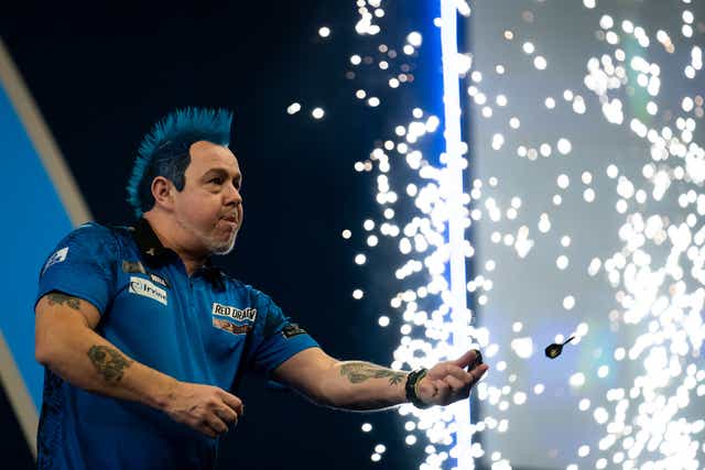 Peter Wright is through to the World Darts Championship final (Aaron Chown/PA)