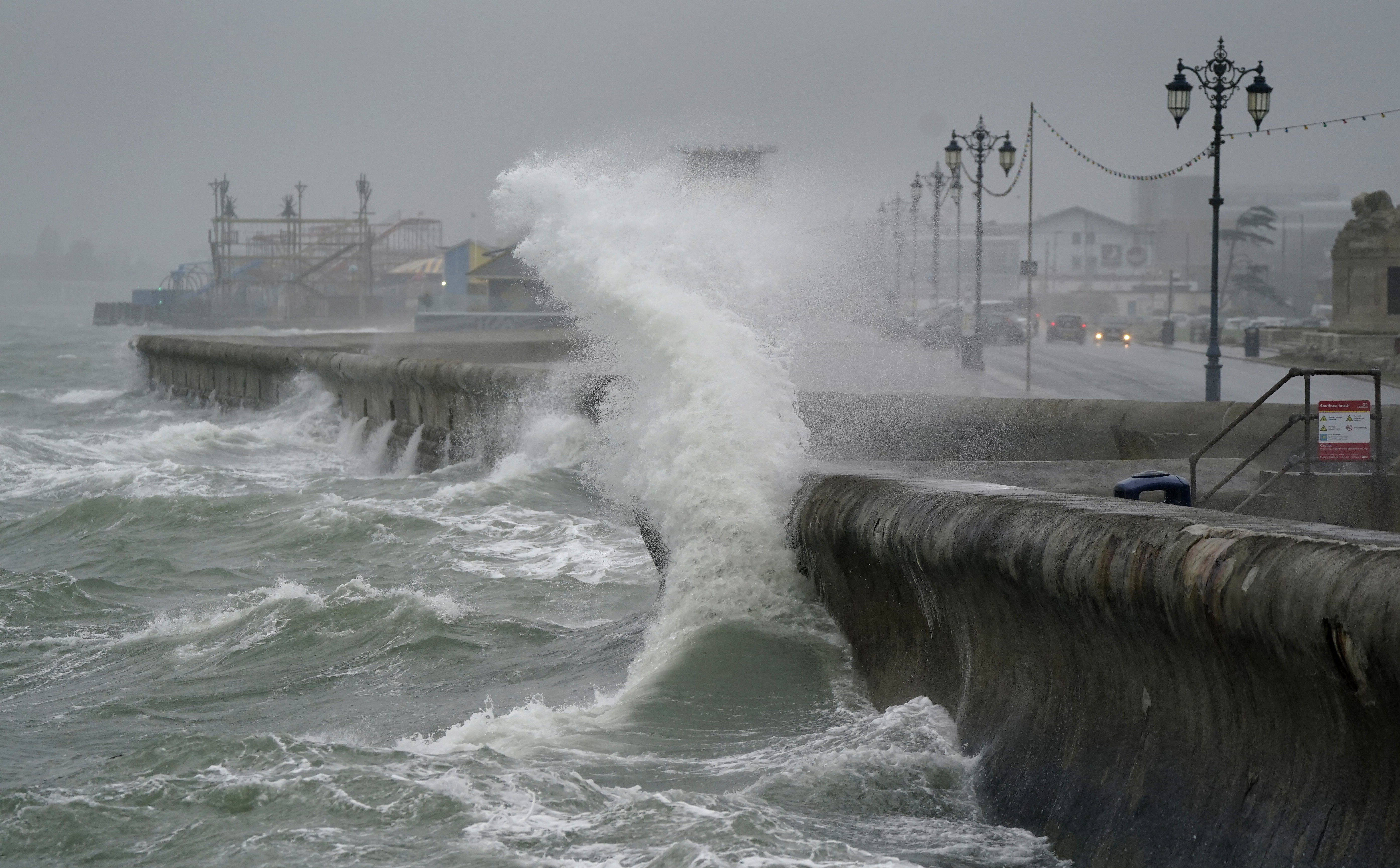 Waves crash against the sea front in Southsea as Storm Barra hit the UK (Andrew Matthews/PA)