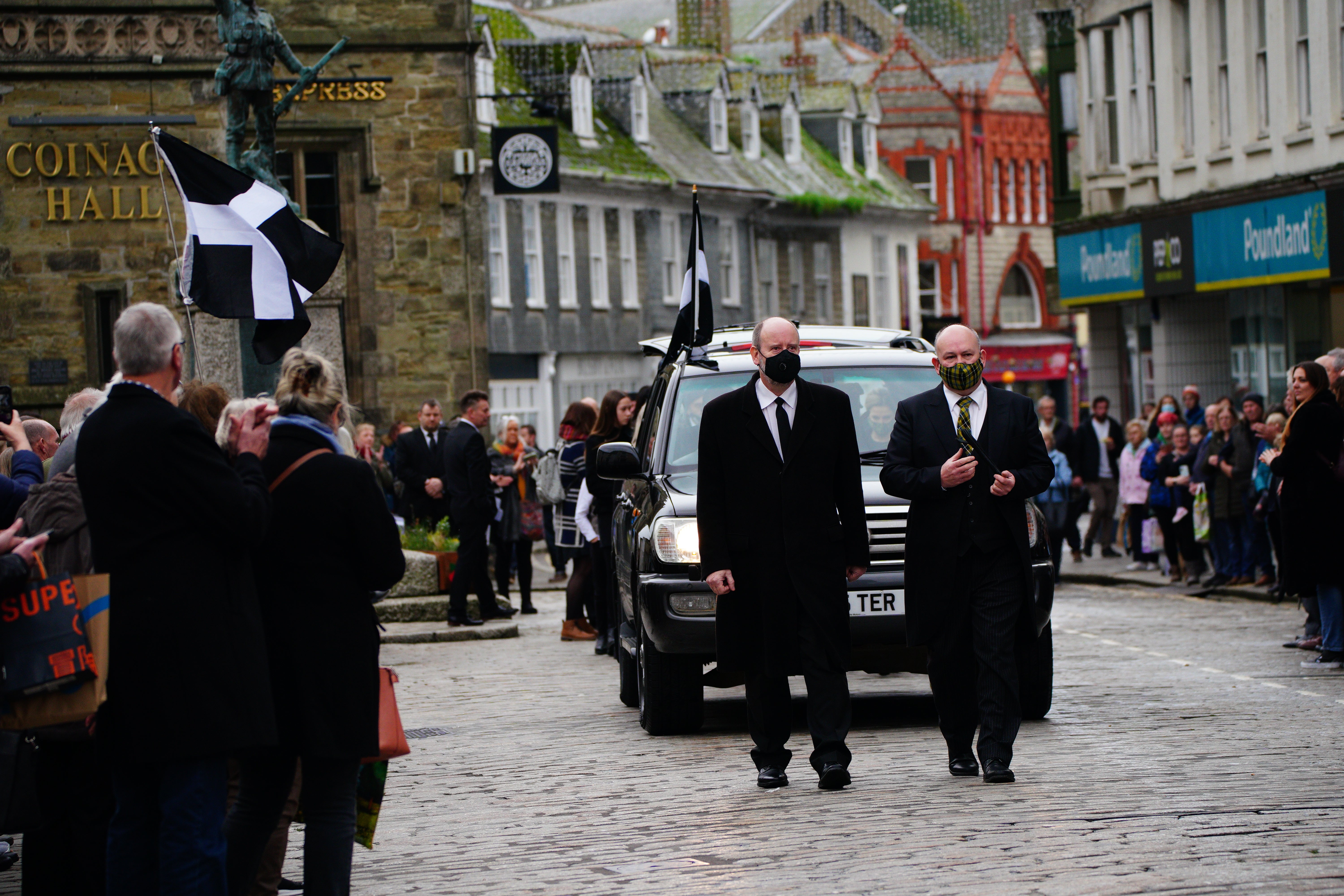 The funeral cortege leads the mourners as they arrive for the funeral of Cornish comedian Jethro at Truro Cathedral in Cornwall. Jethro, real name Geoffrey Rowe, died on December 14 after contracting Covid-19 (Ben Birchall/PA)