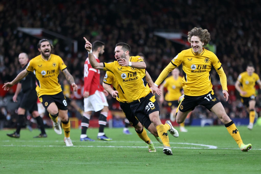 Joao Moutinho of Wolverhampton Wanderers celebrates after scoring the 82nd-minute winner at Old Trafford