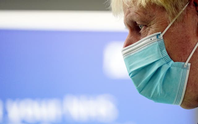 Prime Minister Boris Johnson during a visit to a vaccination hub (Steve Parsons/PA)