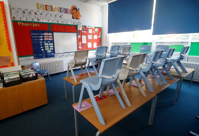 Children are returning to school in Northern Ireland this week amid a rise in the number of Covid cases (Martin Rickett/PA)