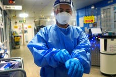 Omicron variant ‘may be what lifts us out of the pandemic’, says Denmark health official