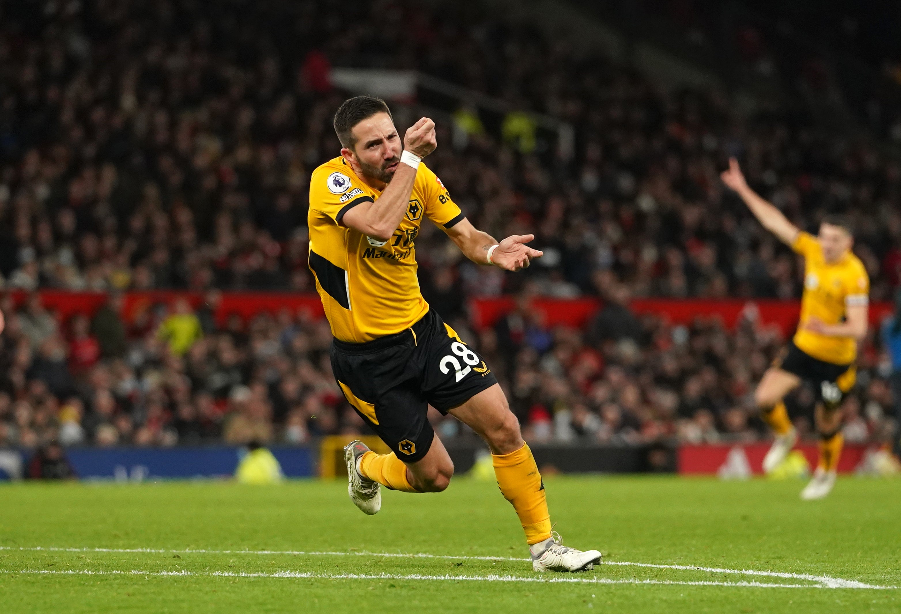 Joao Moutinho celebrates scoring for Wolves at Old Trafford (Martin Rickett/PA)