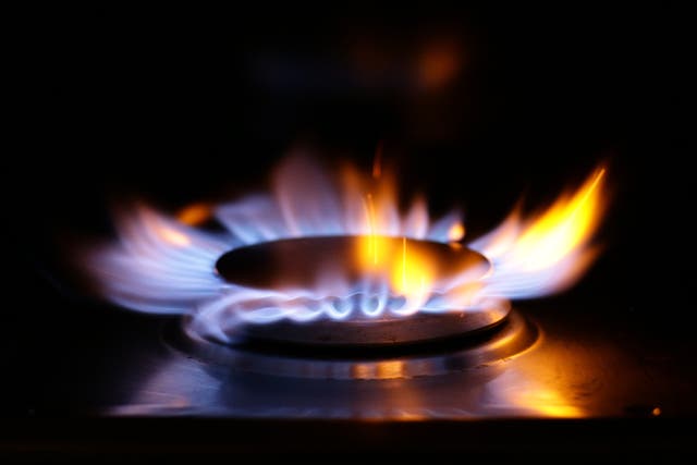 A lit ring on a gas hob at a home in north London (Yui Mok/PA)