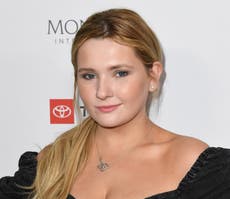 Abigail Breslin hits back at fan who called her a loser for wearing a mask after her dad died of Covid 