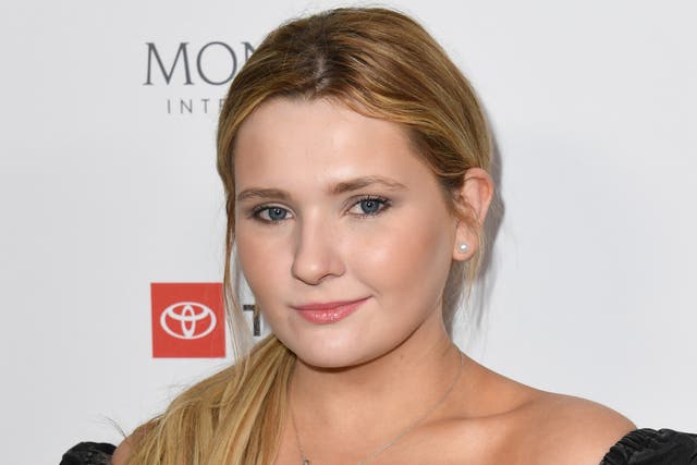 <p>Abigail Breslin has hit out at a troll who called her father ‘weak’ </p>