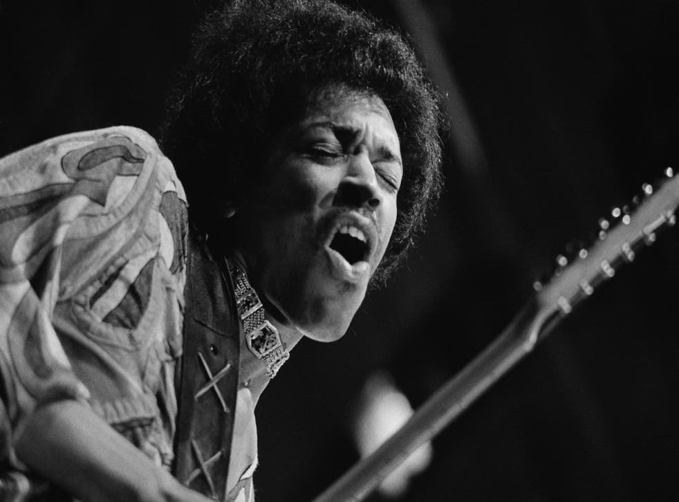 <p>Jimi Hendrix mid-guitar break</p>