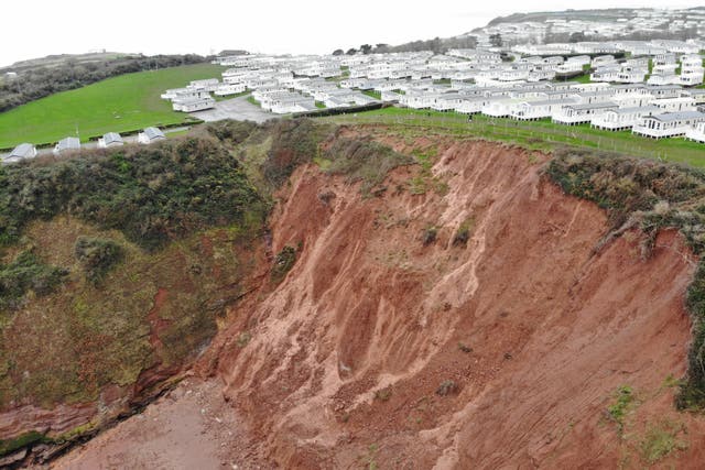 <p>Serious coastal erosion near Sandy Bay caravan park near Exmouth, capturing the extent of East Devon’s cliff falls</p>