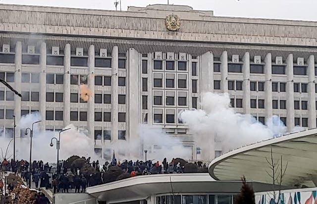 <p>Smoke rises up at a protest in Almaty, Kazakhstan, on 5 January, 202</p>