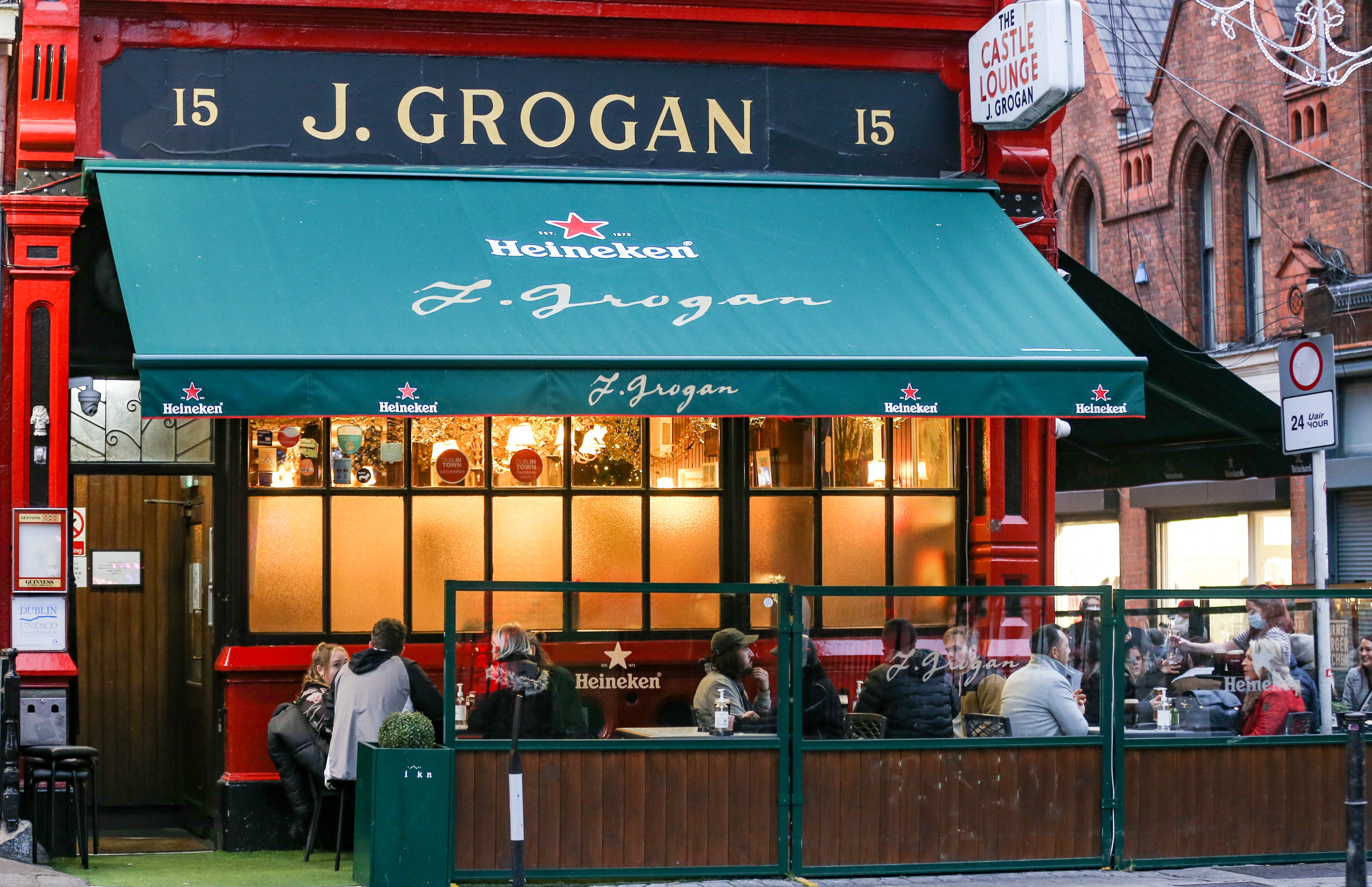 People socialising in Dublin before Christmas (Damien Storan/PA)