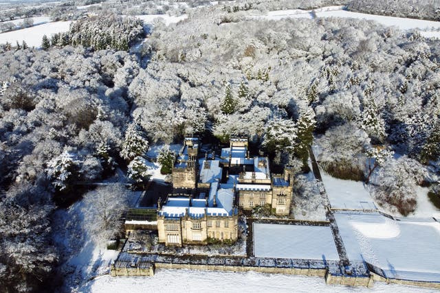 Snow covers Beaufront Castle near Hexham in Northumberland (Owen Humphreys/PA)